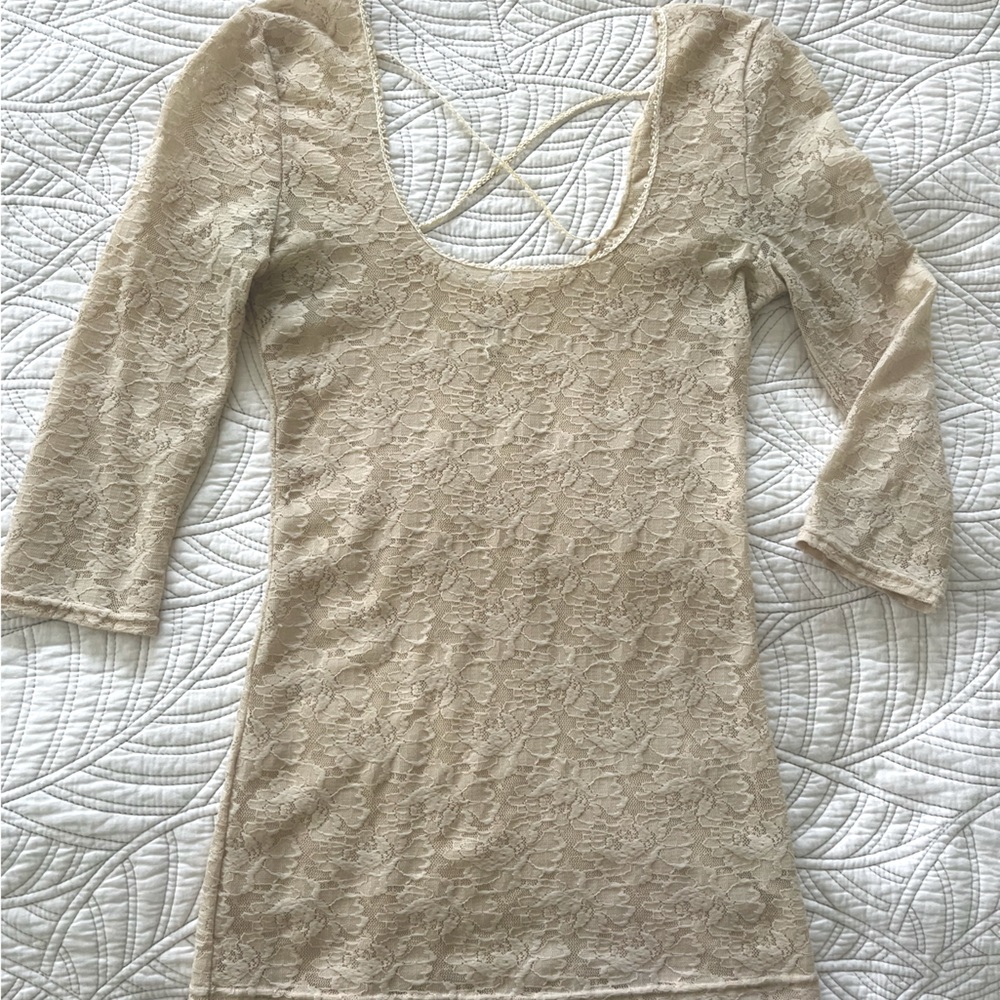 Free people quarter length lace shirt in cream/ivory.